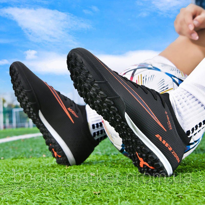Футбольні сороконіжки Tezaz Turf Ground з амортизацією та носком, чорно-помаранчеві